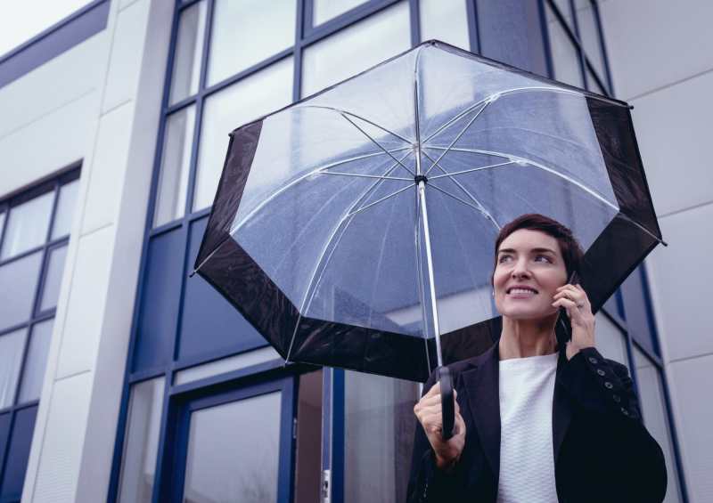 business-woman-holding-umbrella